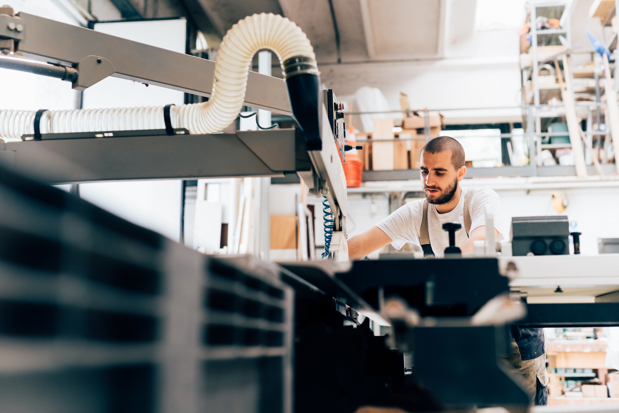 Carpenter working on machine